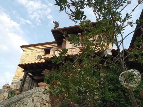 THE STONE HOUSE